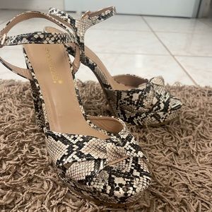 Neutral Snakeskin platform heels